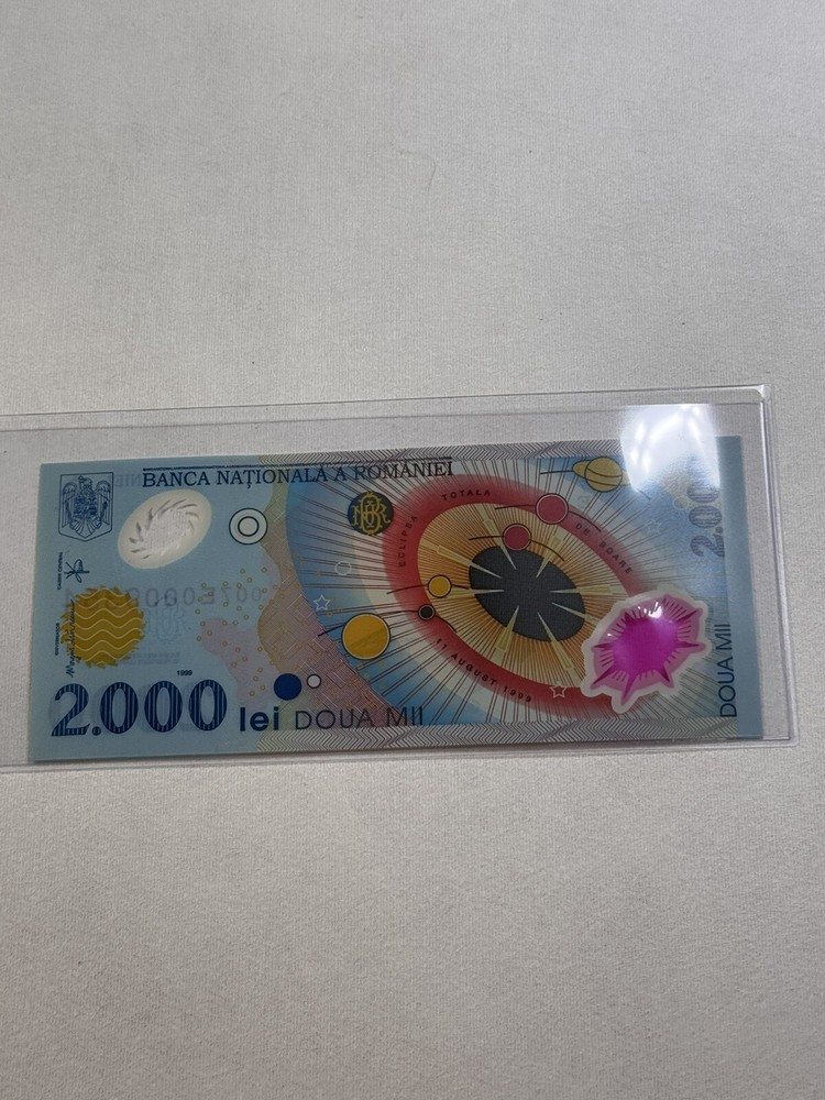 1999 Romania 2000 Lei Total Eclipse Polymer Banknote P# 111a