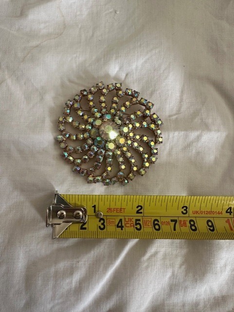 large statement sparkley brooch