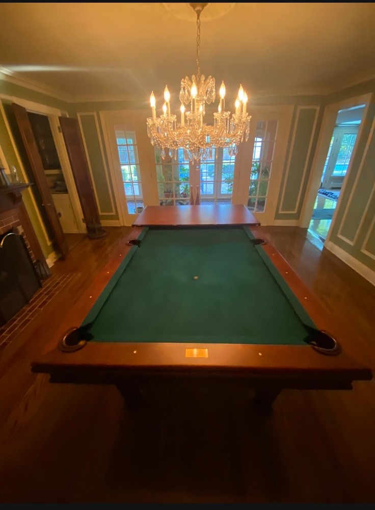 Elegant 8-foot maple pool table that transforms into a dining table. Barely used