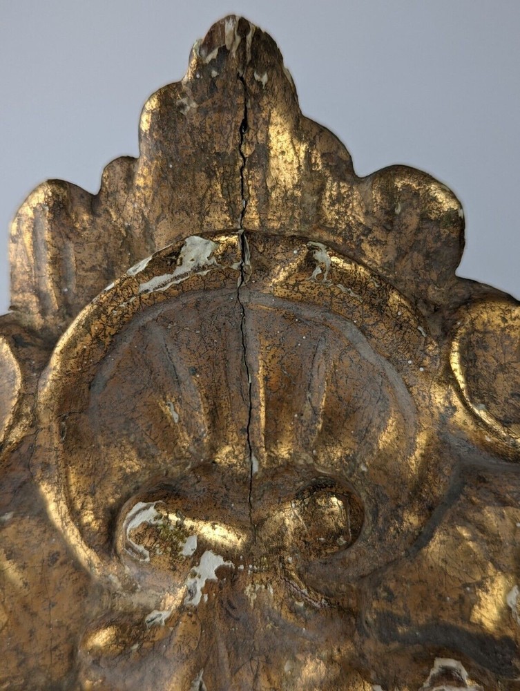 Antique gilt stuccoed wood frame