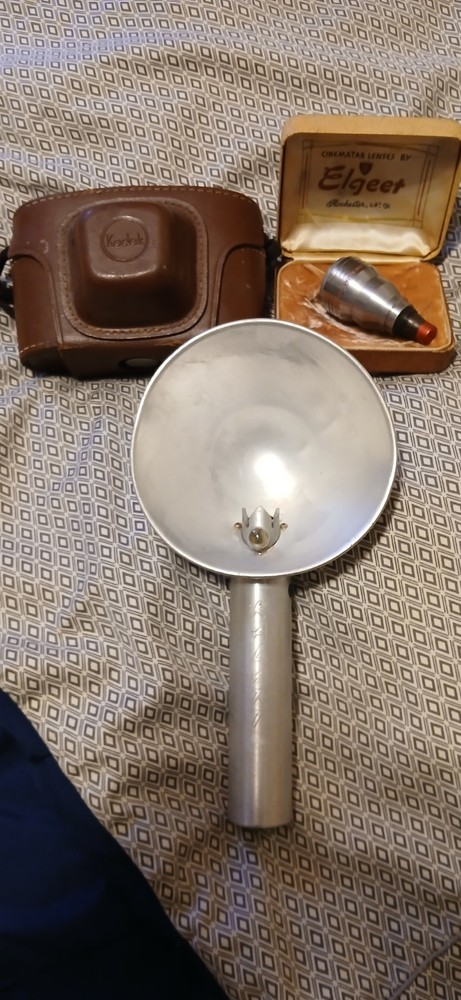 Vintage Camera,Lens, And Flash Bulb.