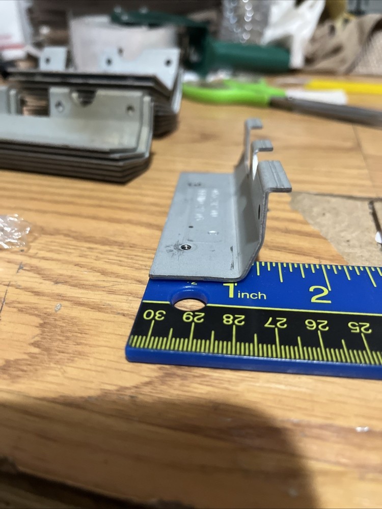 Igt coin in mounting bracket