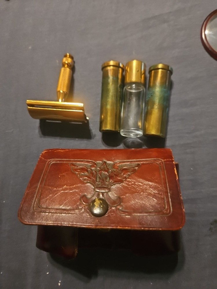 Vintage Gillette brass razor with leather case