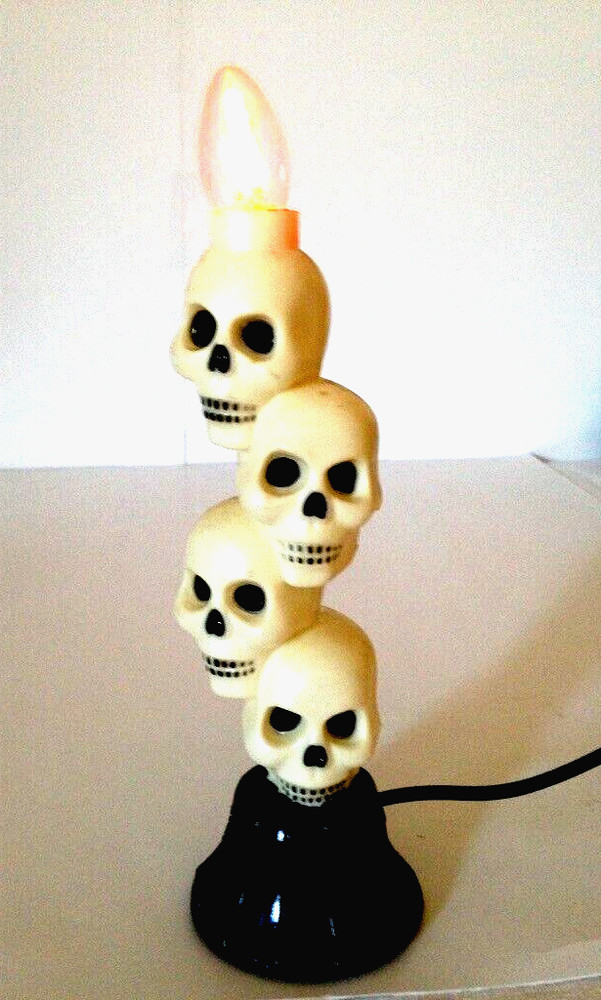 Vtg. Plastic Flickering Lighted Stacked Skeleton Skulls Window Decor 9"