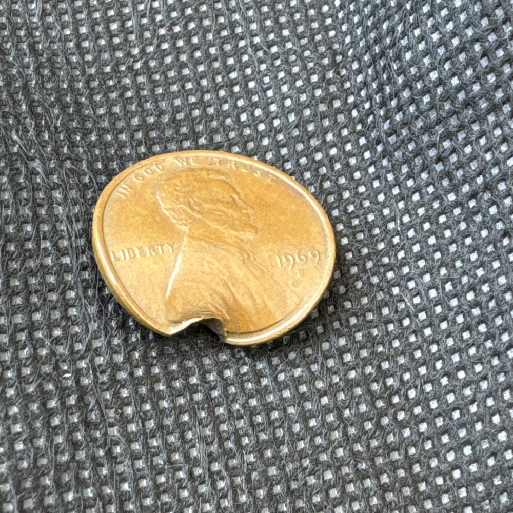 1969 D Penny with Bullet Damage