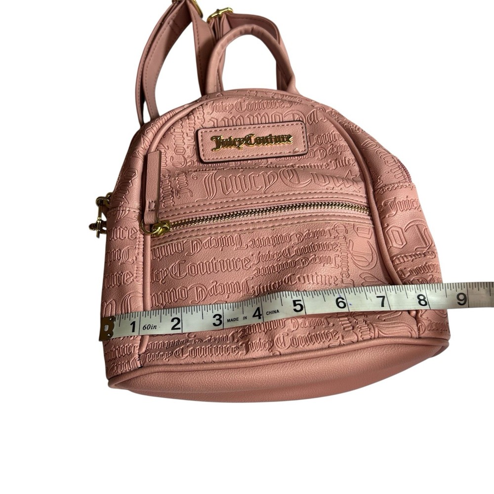 Backpack Elegant Juicy Couture backpack in blush. Embossed logo design. Includes