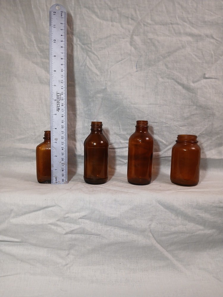 Antique AMBER GLASS apothecary Bottles
