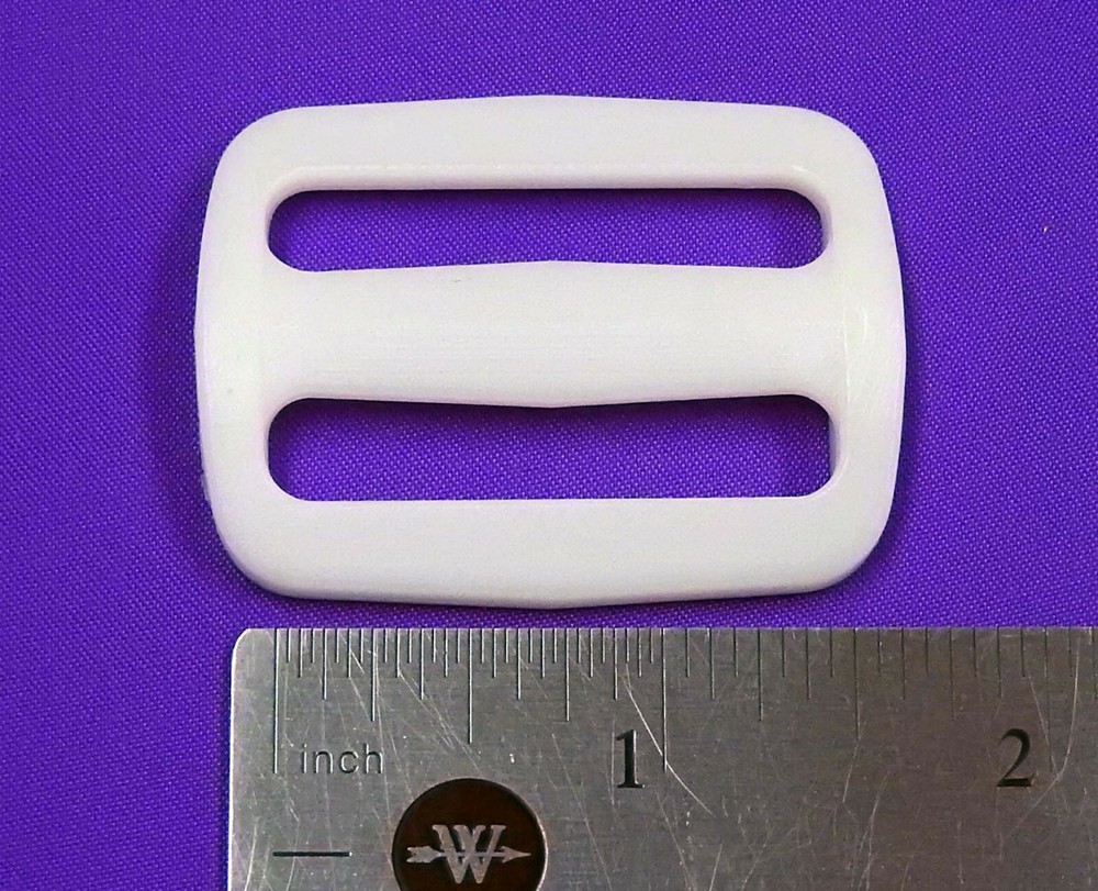 1.5" (38mm) White plastic 10 pcs TRI-GLIDES for adjusting strap length. Sturdy
