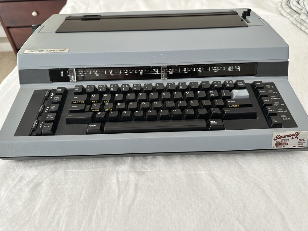 Swintec 1186 CMP Electronic Typewriter with extra daisy wheels