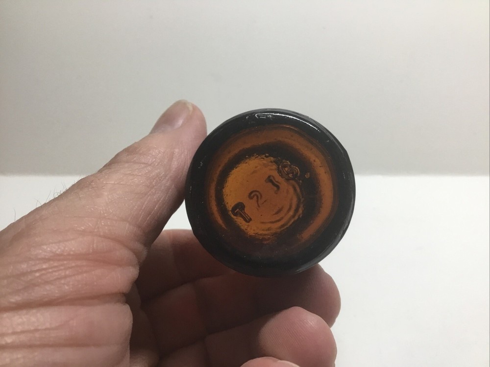 Small Squatty Antique Amber Sample Liquor Bottle.