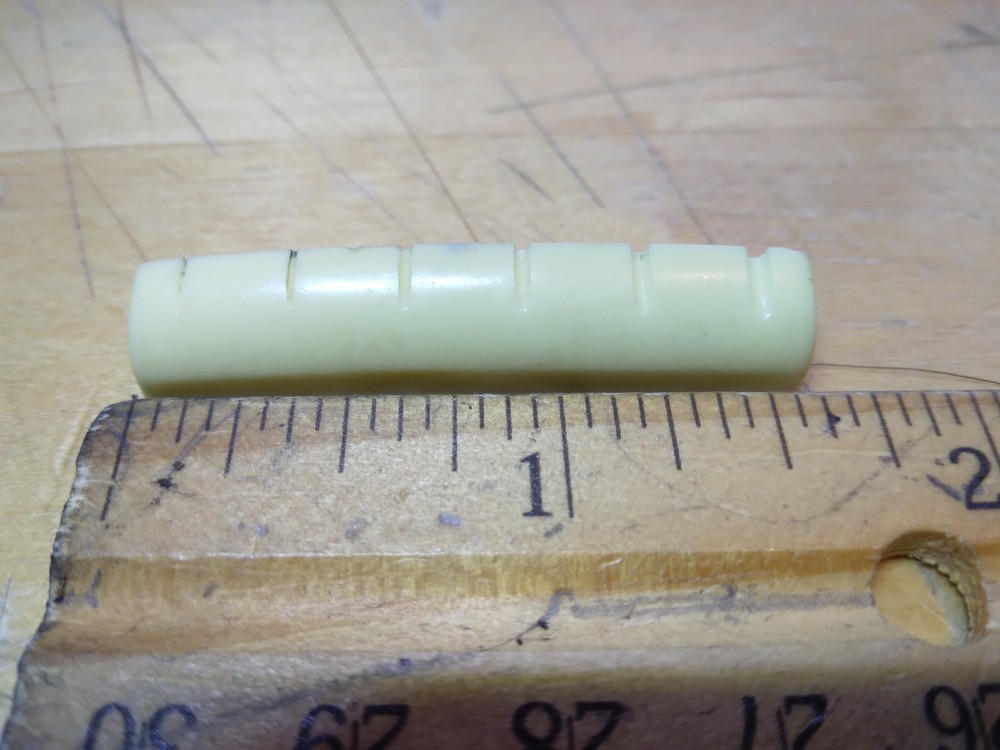 Vintage unbranded Plastic guitar Nut, white