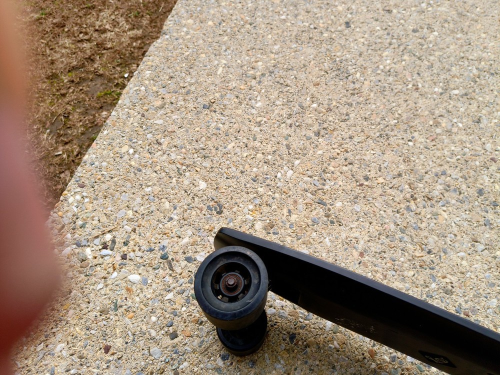 electric skateboard. So flow Lou board, needs charge Chord. Black. Durable polyu
