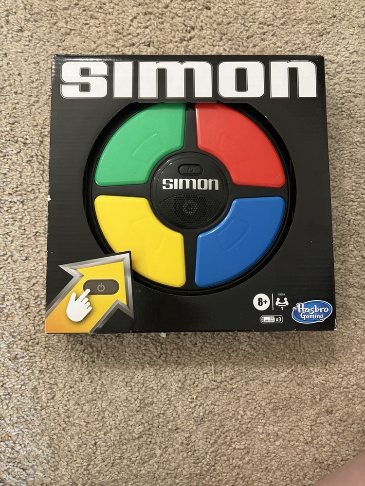 Hasbro E93835L0 Simon Handheld Electronic Game