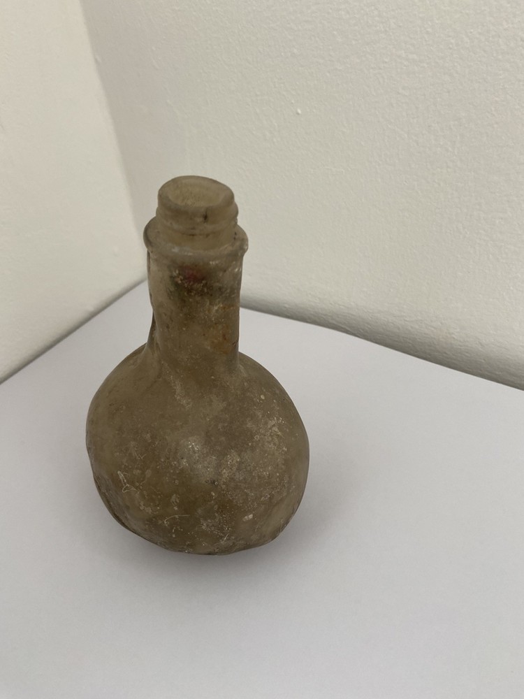 OLD Deformed glass bottle