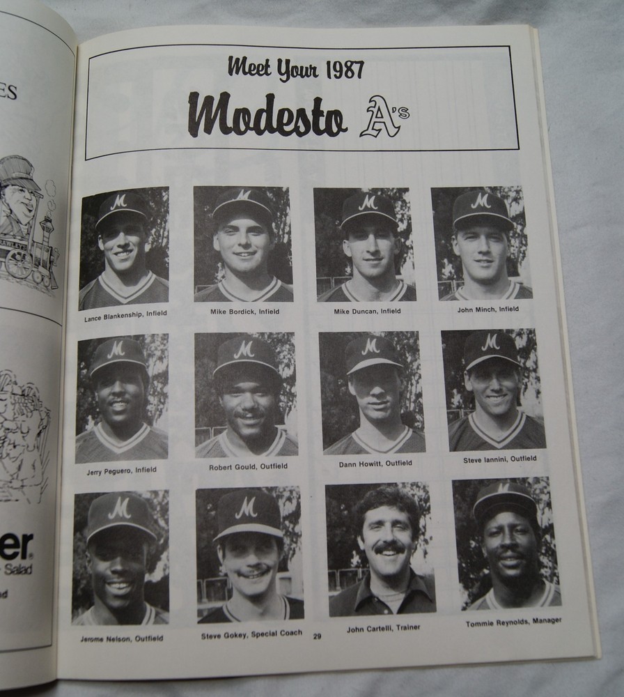 1987 modesto a's official souvenir program writing on cover