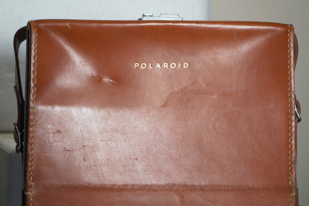Polaroid Land Camera Model 8oA Wink Light Light Reducer & leather case