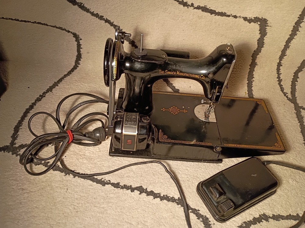 1952 singer featherweight sewing machine.