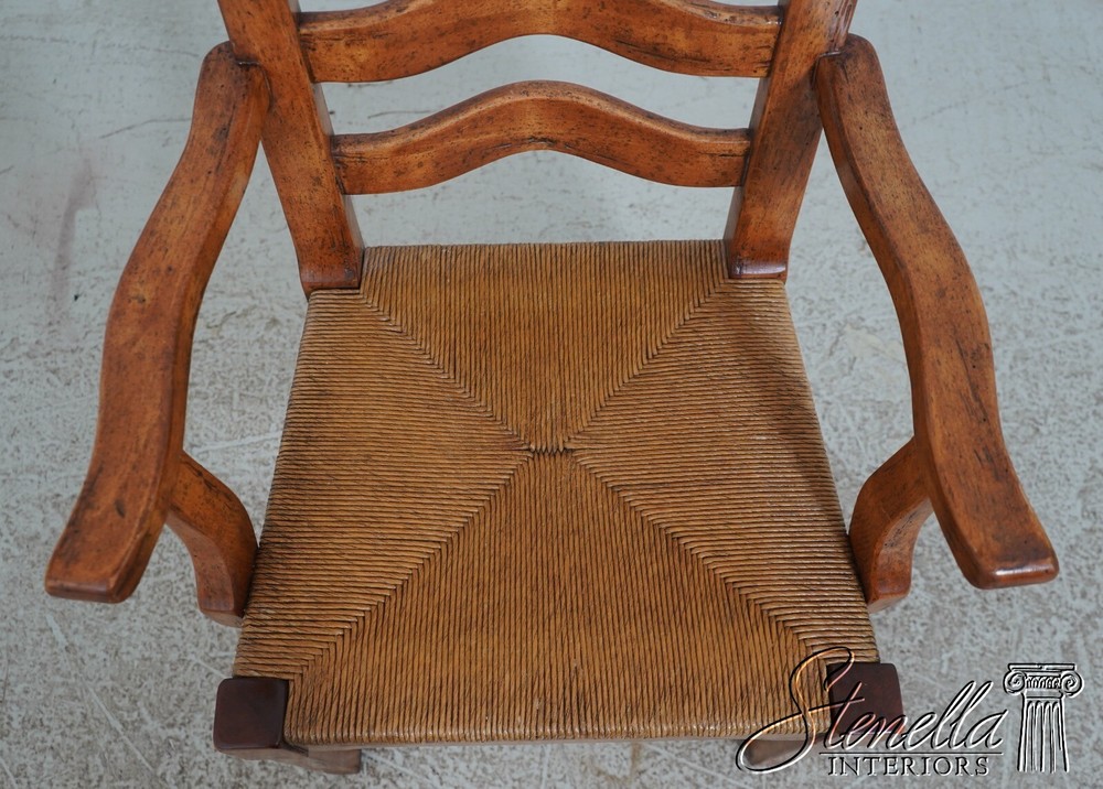 68471: Pair GUY CHADDOCK Distressed Ladderback Armchairs