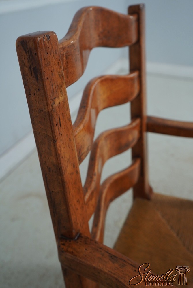 68471: Pair GUY CHADDOCK Distressed Ladderback Armchairs
