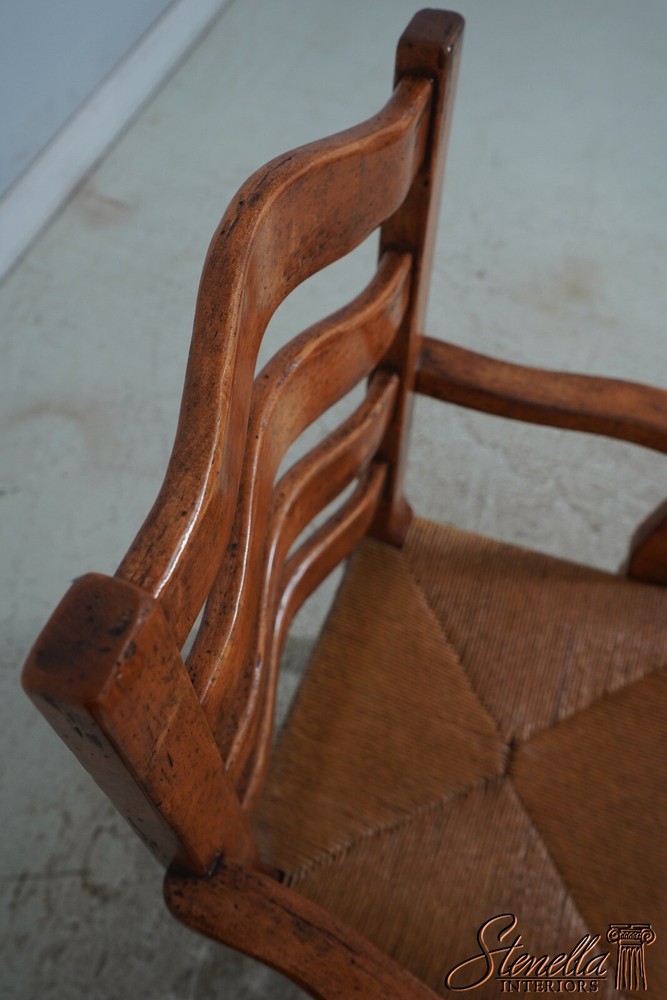 68471: Pair GUY CHADDOCK Distressed Ladderback Armchairs