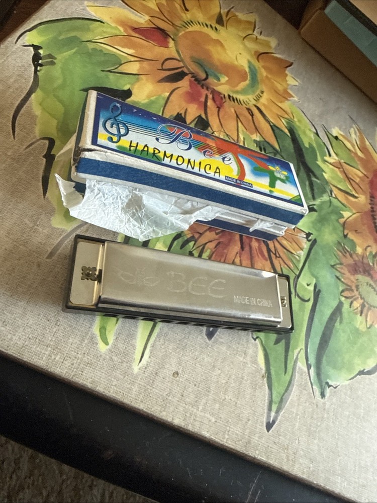Harmonica. Bee Harmonica Never Used.  Musical instrument. 10 Square Holes