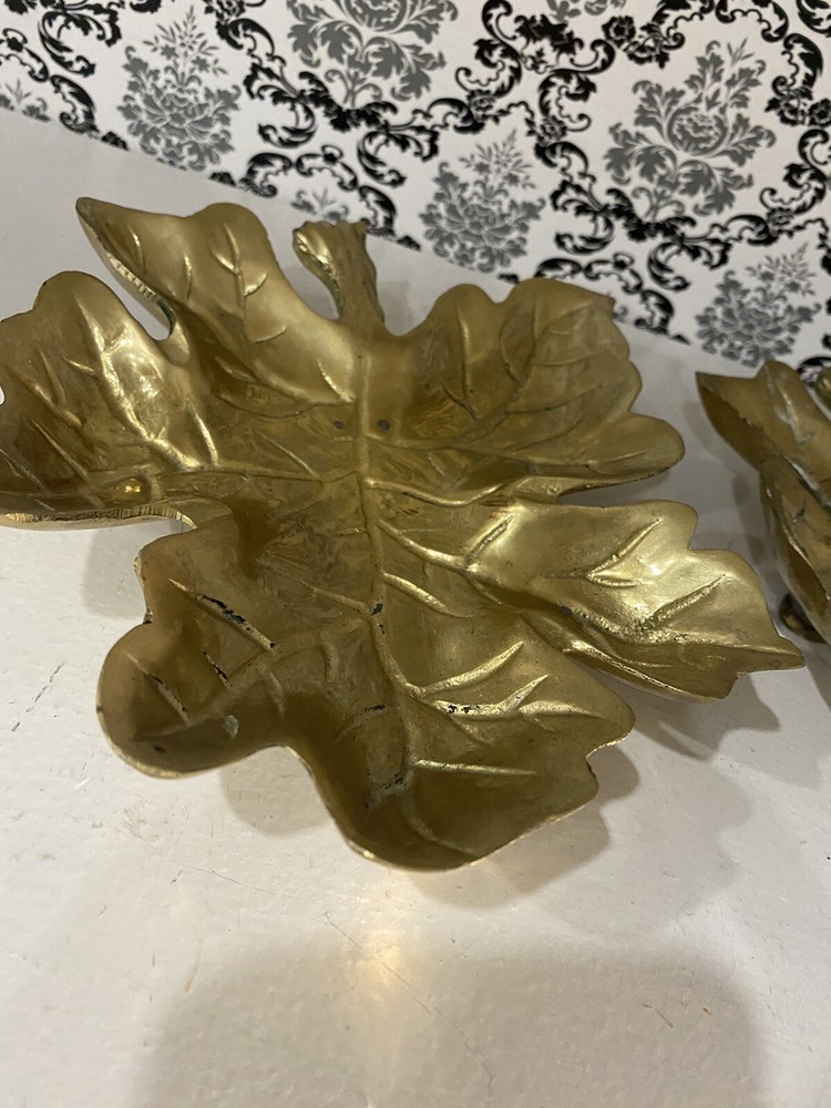 two beautiful solid brass leaf design wall decor. 7 inches tall.
