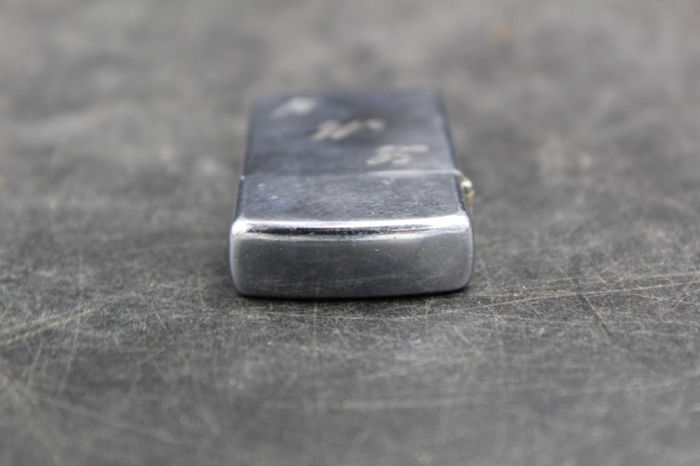 Zippo Lighter 2-1/4” X 1-1/8”.