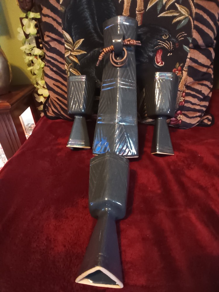 Ceramic blue iridescent sheen pitcher with 2 goblets ,pitcher is signed.READ.