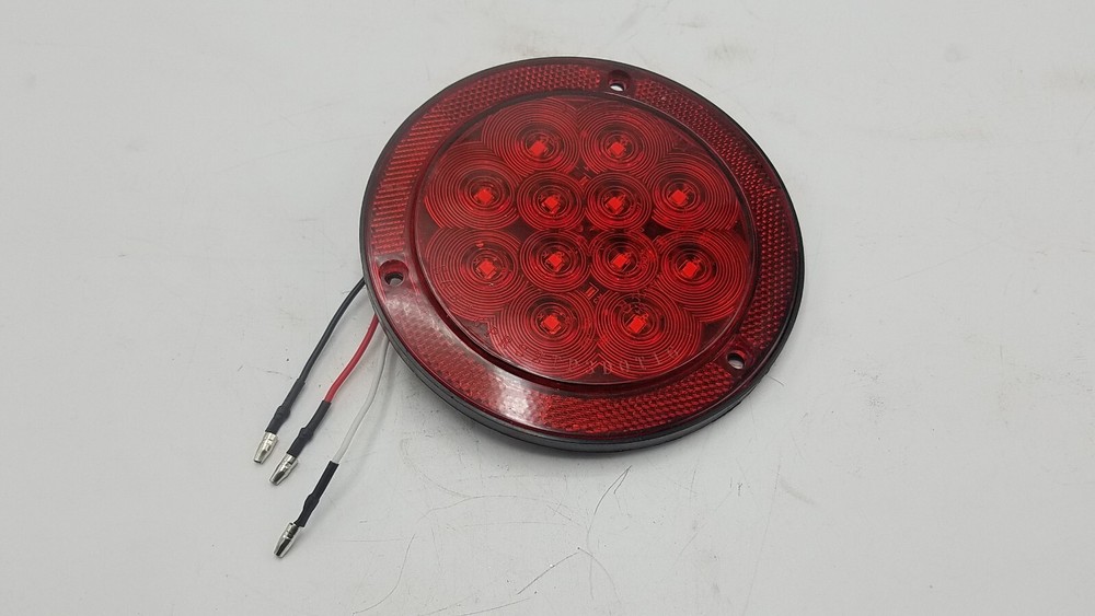 Jammy, Flat 4” Round LED Surface Mount Stop/Tail/Turn Light with Reflector