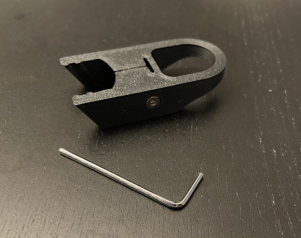 Colt Model 22 finger loop charger, slide racker.