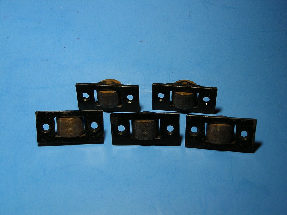 Vintage solid metal rollers for under furniture
