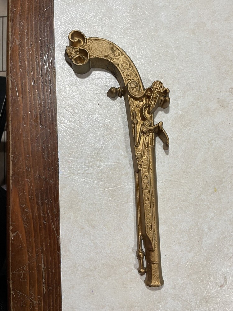 handmade wall hanging gun