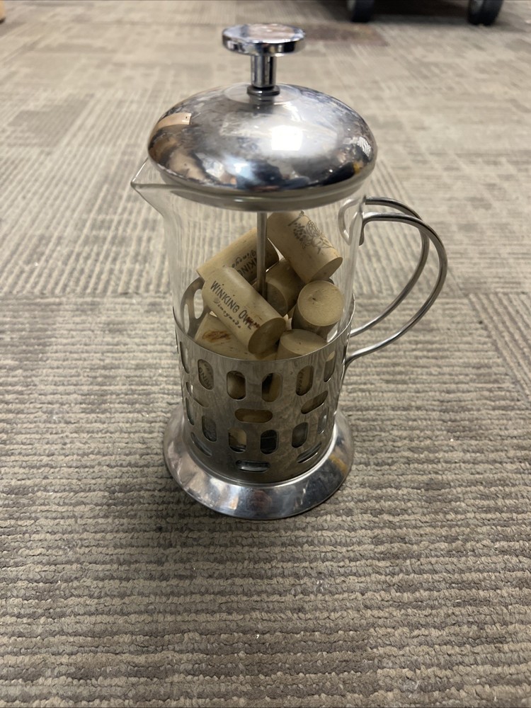 Old Coffee Maker Full Of Wine Corks