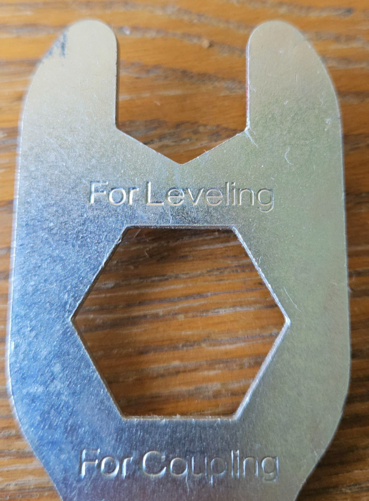 LEVELING, COUPLING, SHIPPING METAL MULTI TOOL.