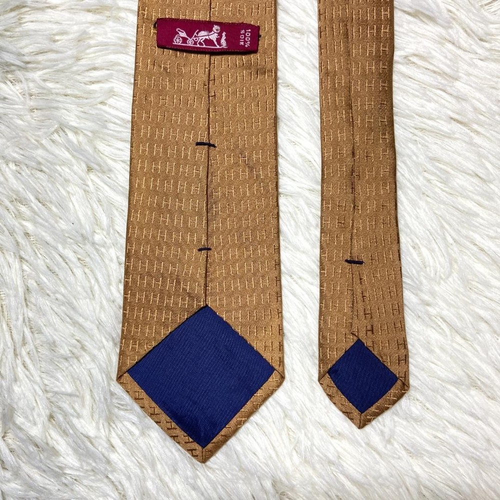 Fasone gold beige H pattern tie glossy