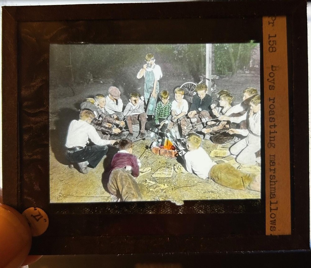c1930s boys roasting marshmallow around campfire color slide