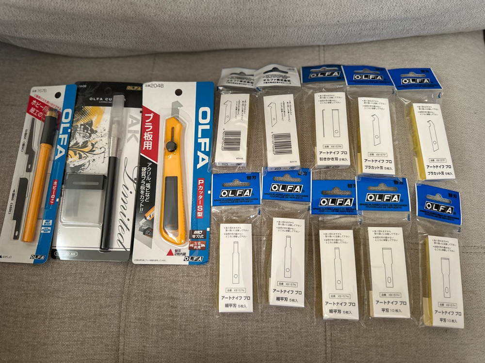 Three OLFA knives packs and 10 replacement blades