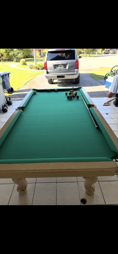 Green Felt Billiard Table with White Legs