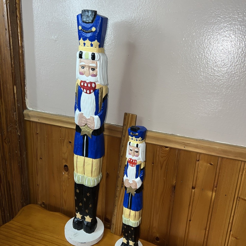 2 Tall decorative nutcracker figurines