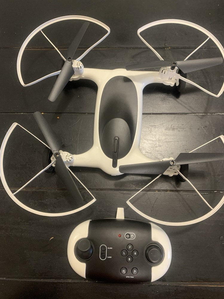 SHARPER IMAGE FLY + DRIVE 7" DRONE RECHARGEABLE DUAL FUNCTION 2.4GHZ LONG RANGE