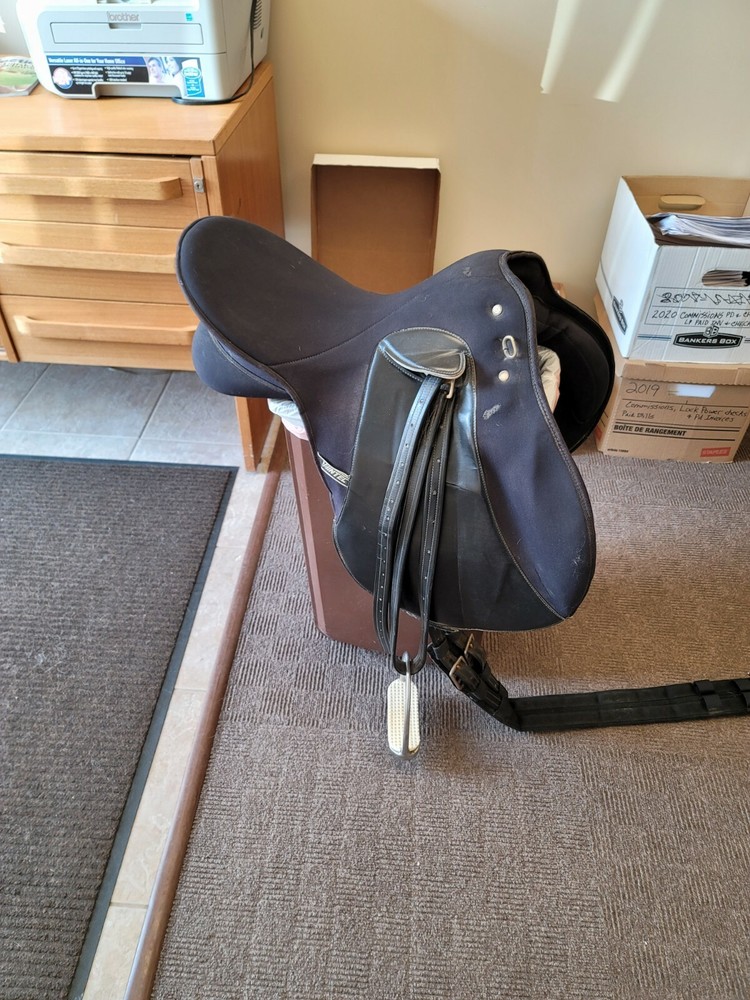 Wintec all purpose saddle with irons and girth strap