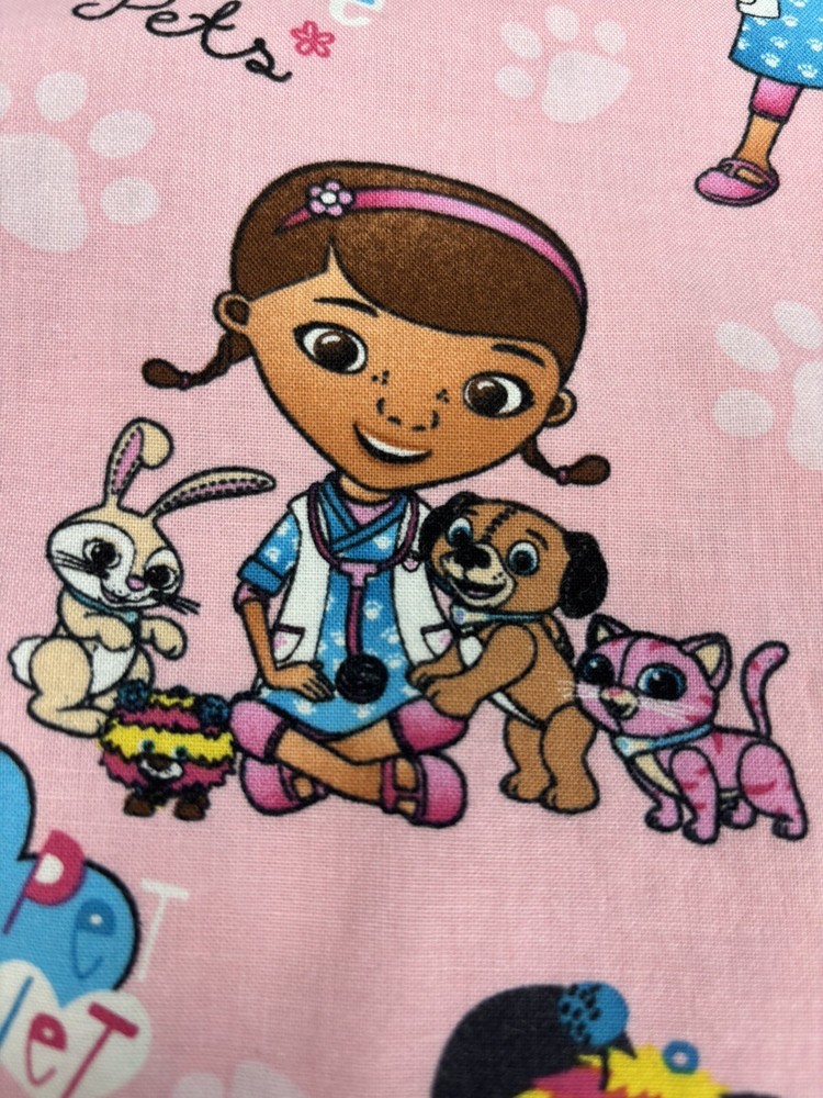 Women’s Disney Doc McStuffins Pink Scrub Top Size Medium
