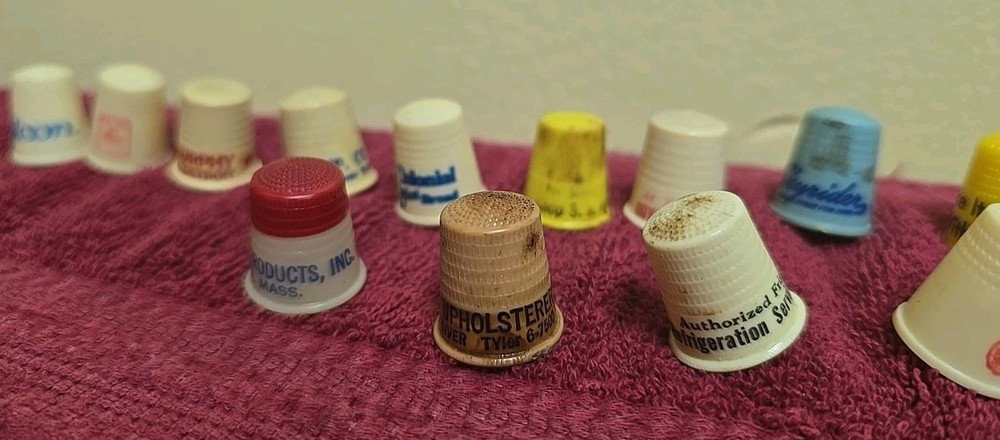 17 Plastic Thimbles 15 Have Advertising On Them
