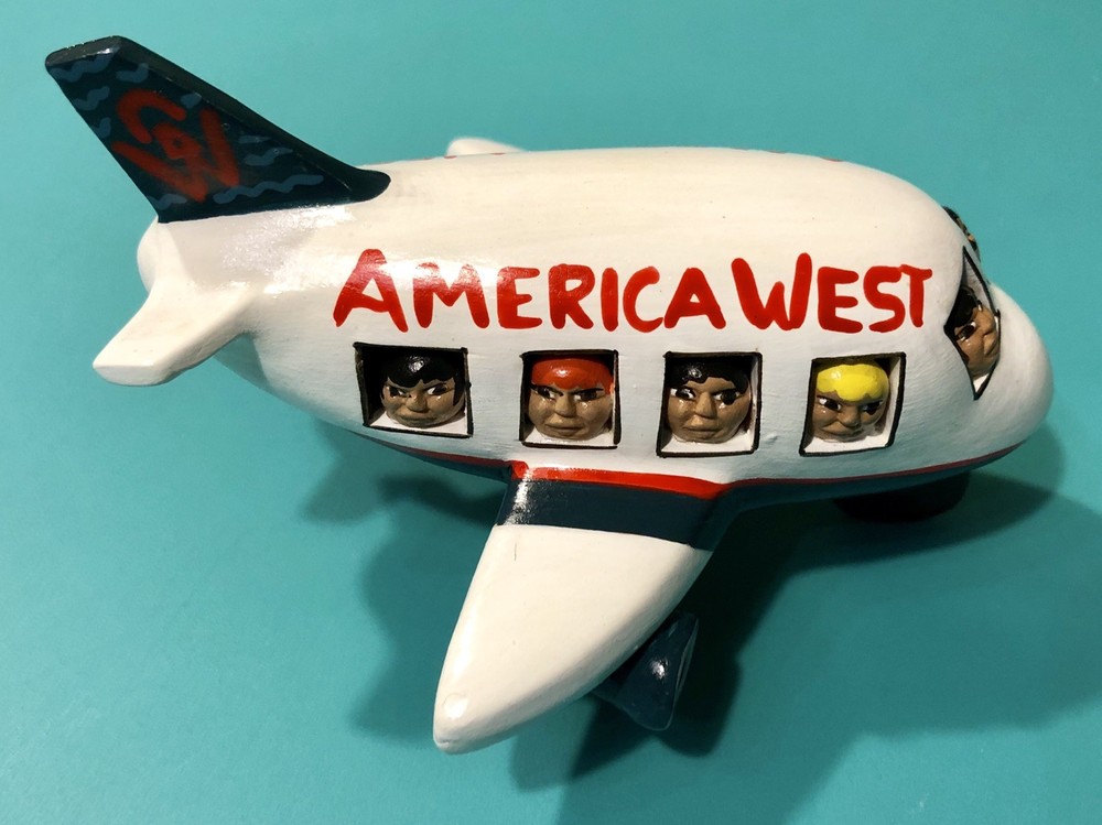 AMERICA WEST AIRLINES HAND PAINTED CERAMIC PLANE