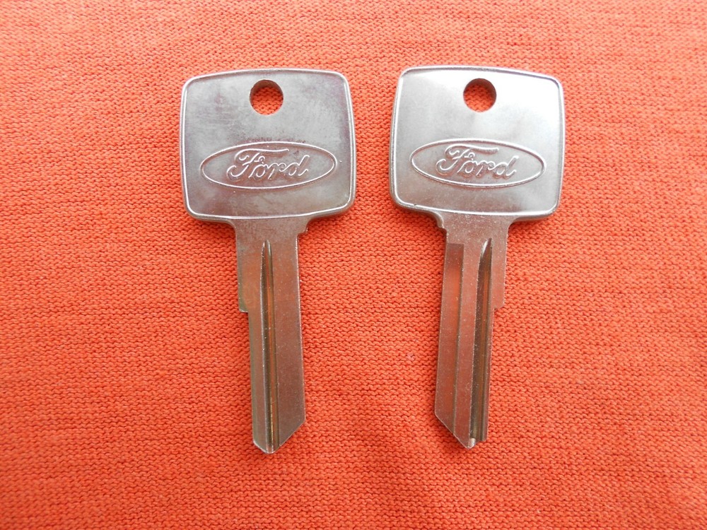 2 FORD LOGO FUEL TOOL BOX COMPARTMENT KEY BLANKS