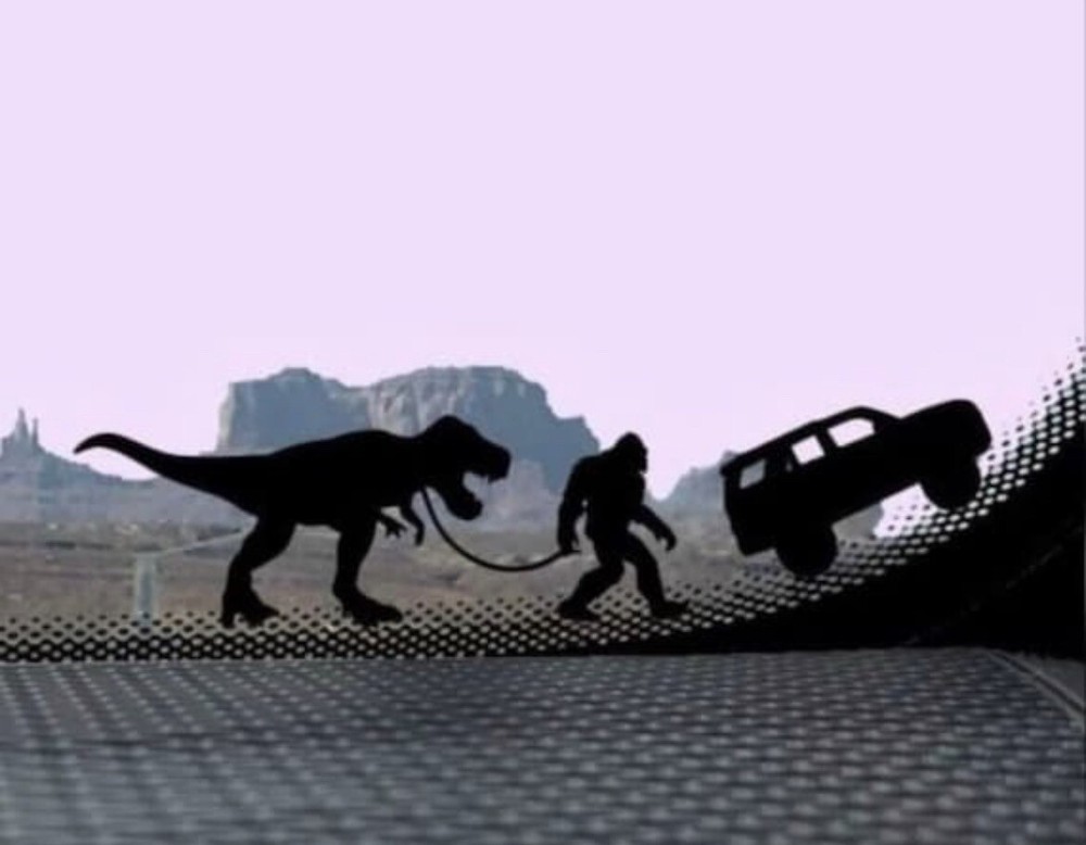 Tiny Bigfoot Pulling T-Rex with SUV Car Decal