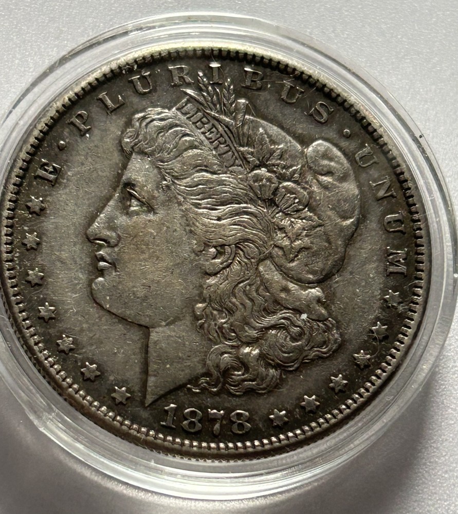 1878 s Morgan silver dollar in protective case