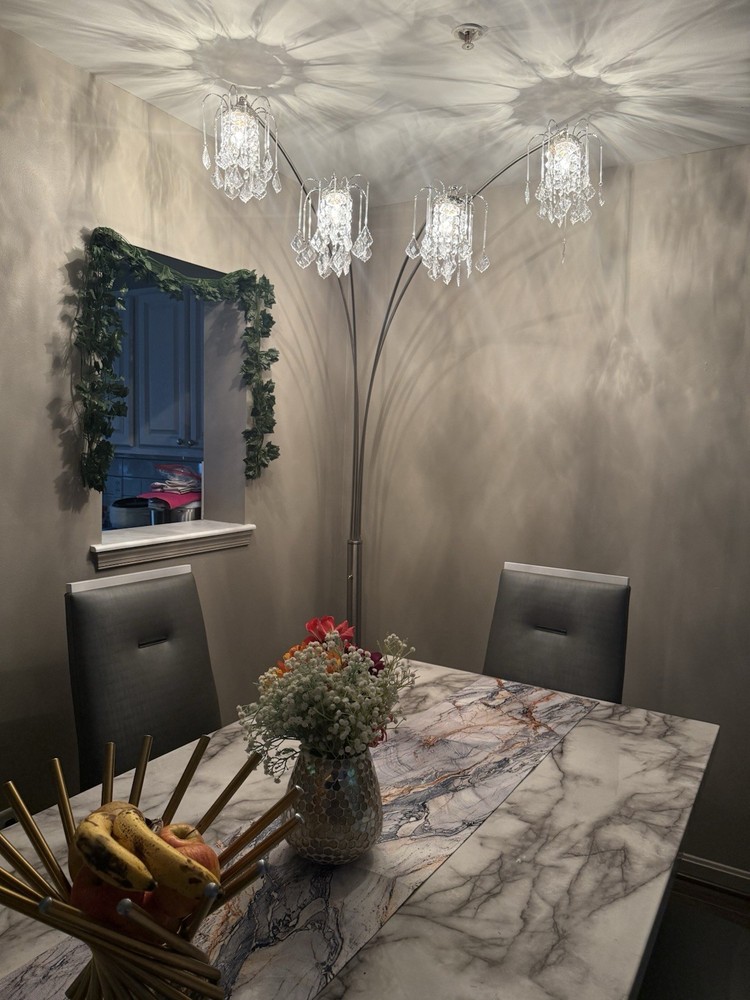 Marble Dining Table with 6 Gray Chairs and Beautiful Buffer with LED lights.
