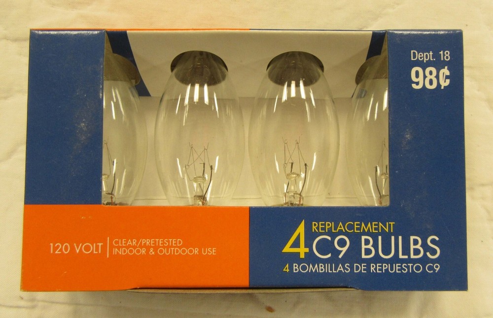 4 clear replacement C-9 bulbs. Intermediate base. 120 volt. 52 packs available.