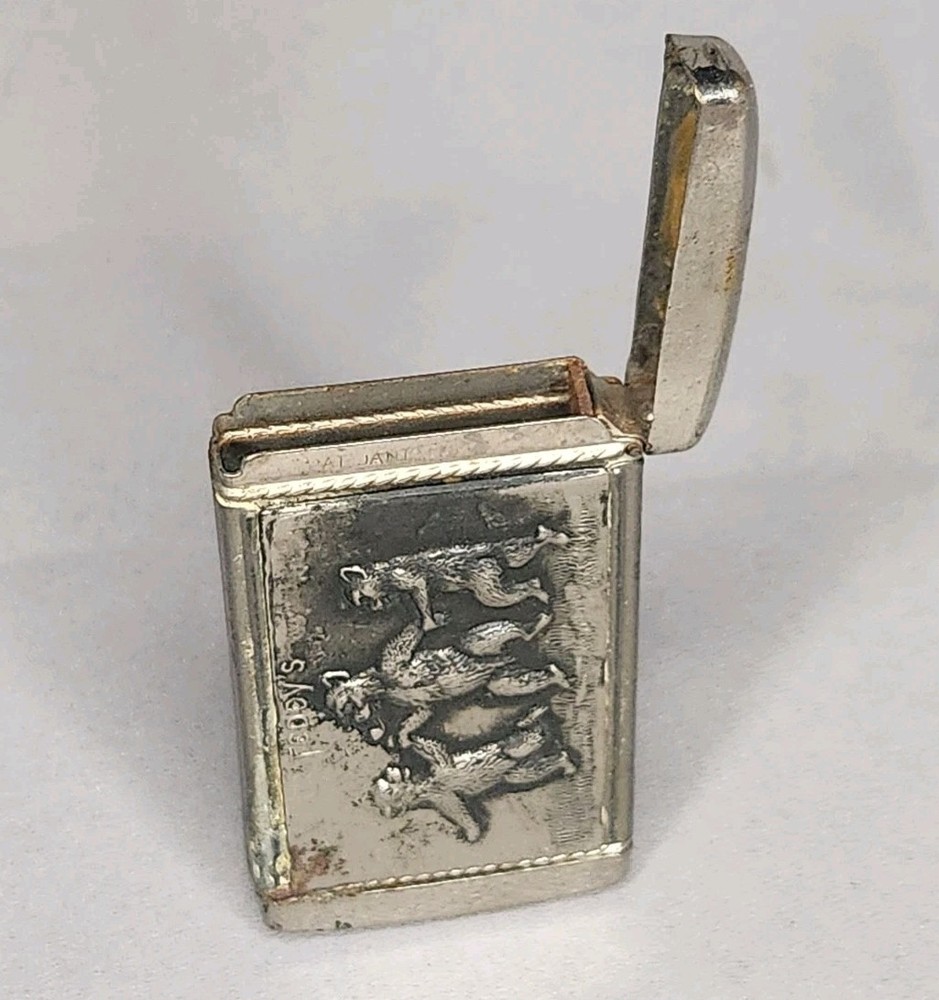 Vintage Vesta Case with Bear Pattern and Ornate Frame Design